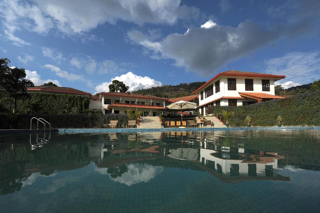 Amritara Ambatty Greens Resort Virajpet Eksteriør billede